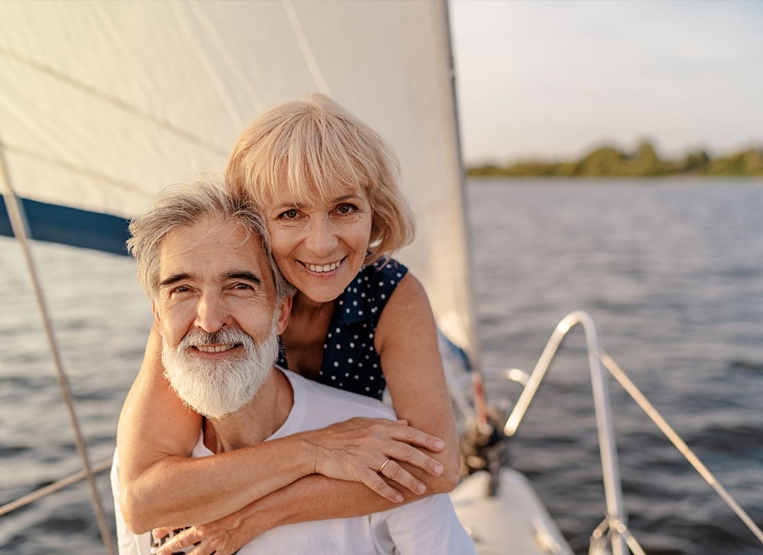 Medicare - Senior Couple Relaxing and Spending Time Together on a Luxury Yacht