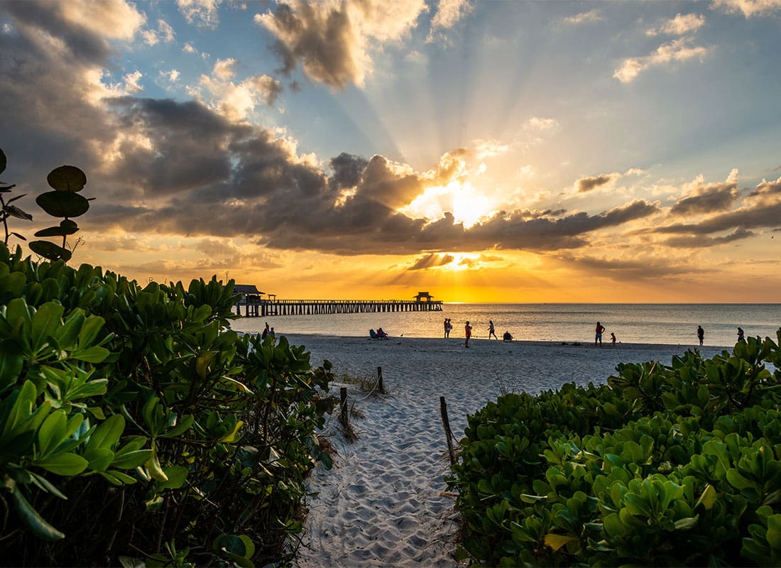Naples, FL - Beautiful Sunset by the Ocean Pier in Southern Florida